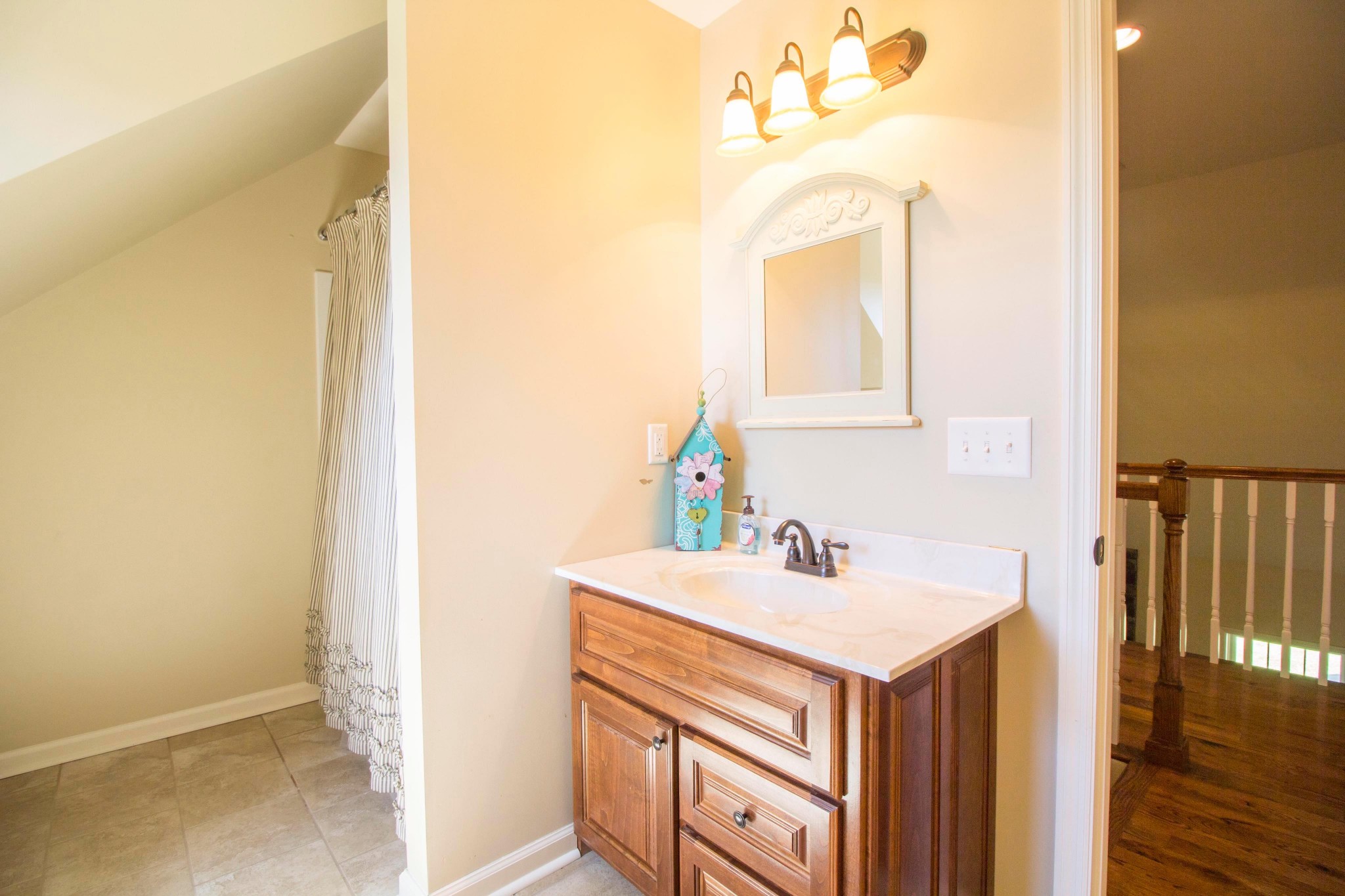 57 Lakeside Drive Carthage, TN 37030 - Photo 28 of 34 a bathroom with a sink and a mirror
