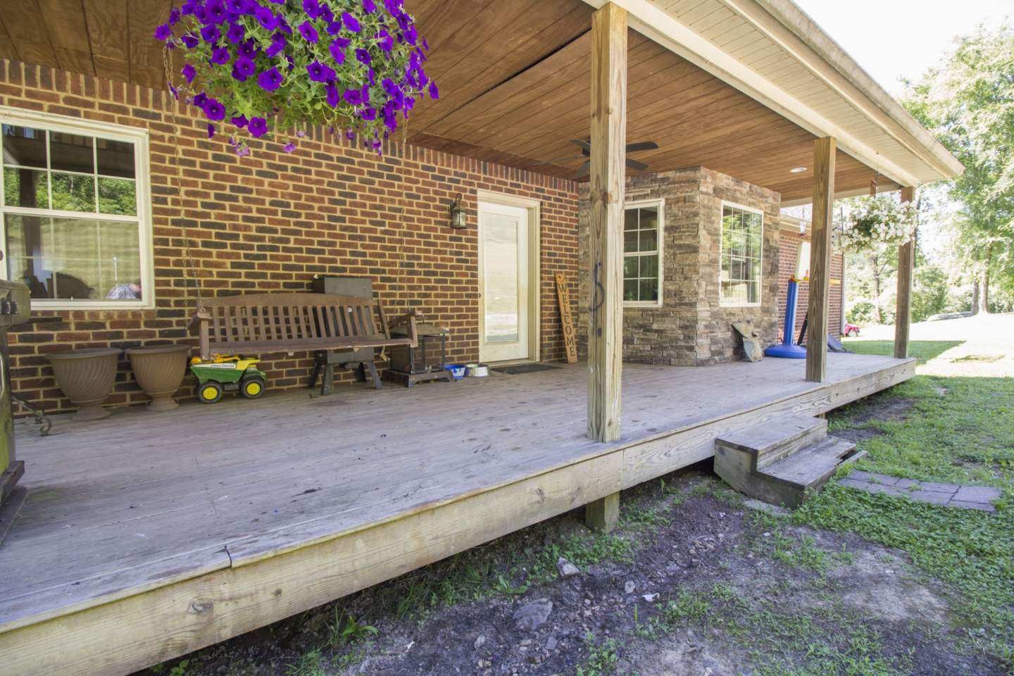 57 Lakeside Drive Carthage, TN 37030 - Photo 33 of 34 a view of a house with backyard and sitting area