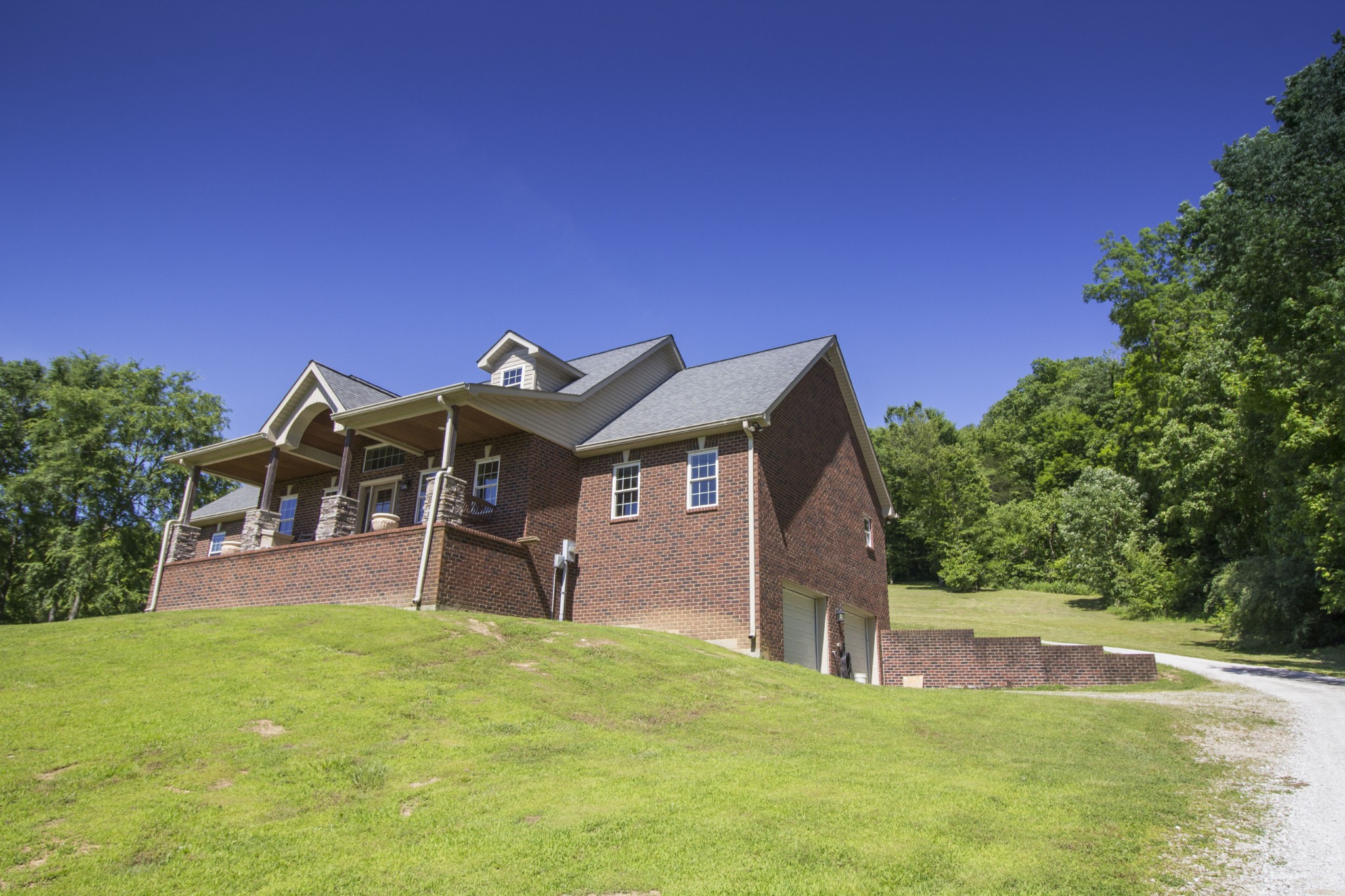 57 Lakeside Drive Carthage, TN 37030 - Photo 4 of 34 a front view of a house with a yard