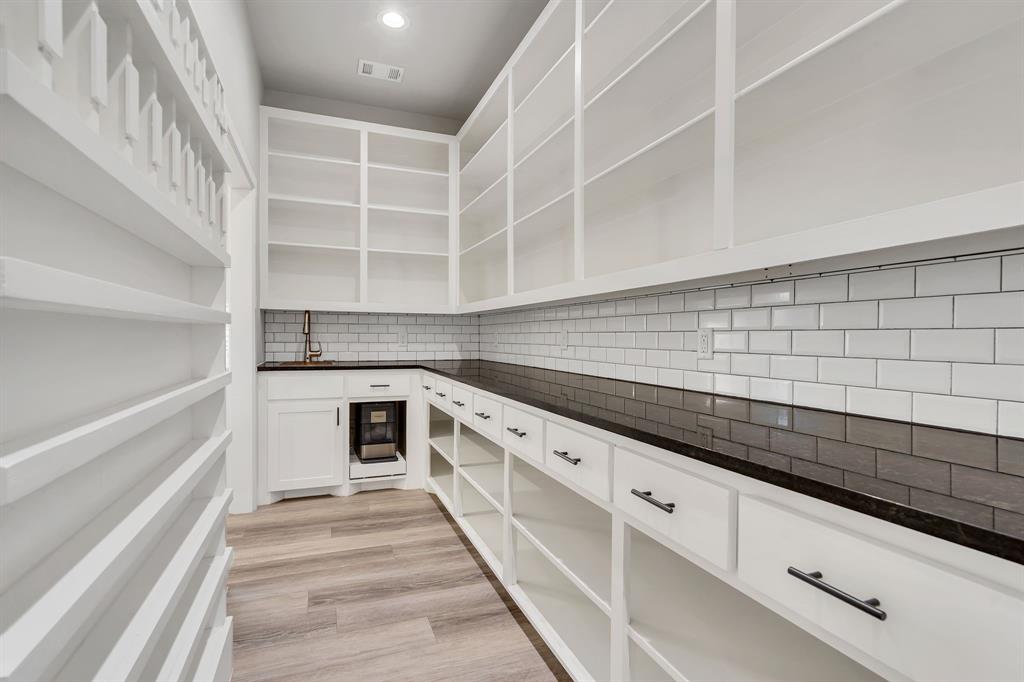 7739 Borth Road Sanger, TX 76266 - Photo 9 of 39 Storage galore with a sink area, dedicated space below to plug in an ice maker