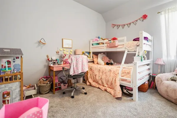 a bed room with furniture and a bed