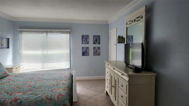a bathroom with a bathtub and a window