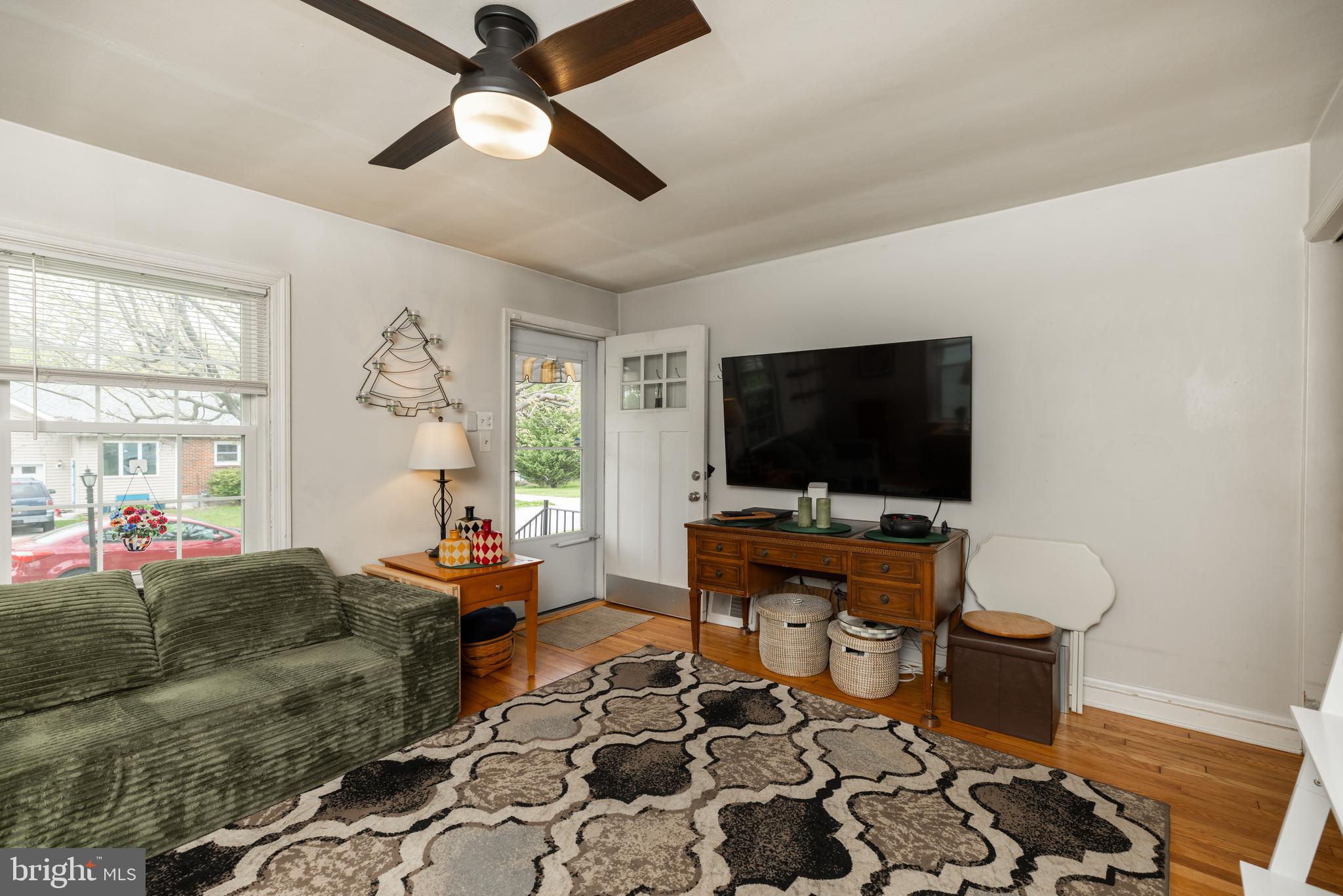 913 Aldon Road Claymont, DE 19703 - Photo 11 of 26 a living room with furniture and a flat screen tv