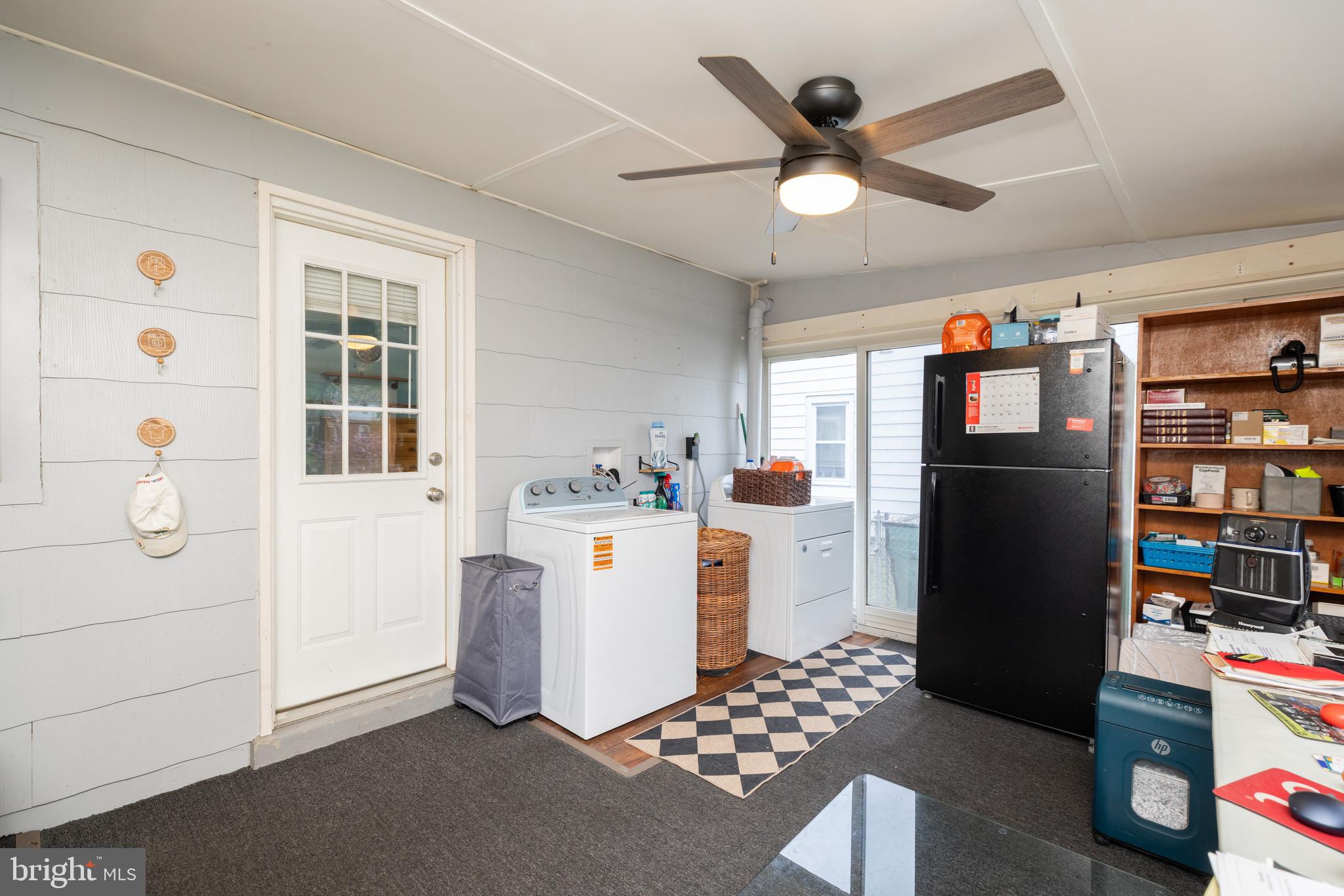 913 Aldon Road Claymont, DE 19703 - Photo 13 of 26 a kitchen with stainless steel appliances kitchen island granite countertop a refrigerator and a stove top oven