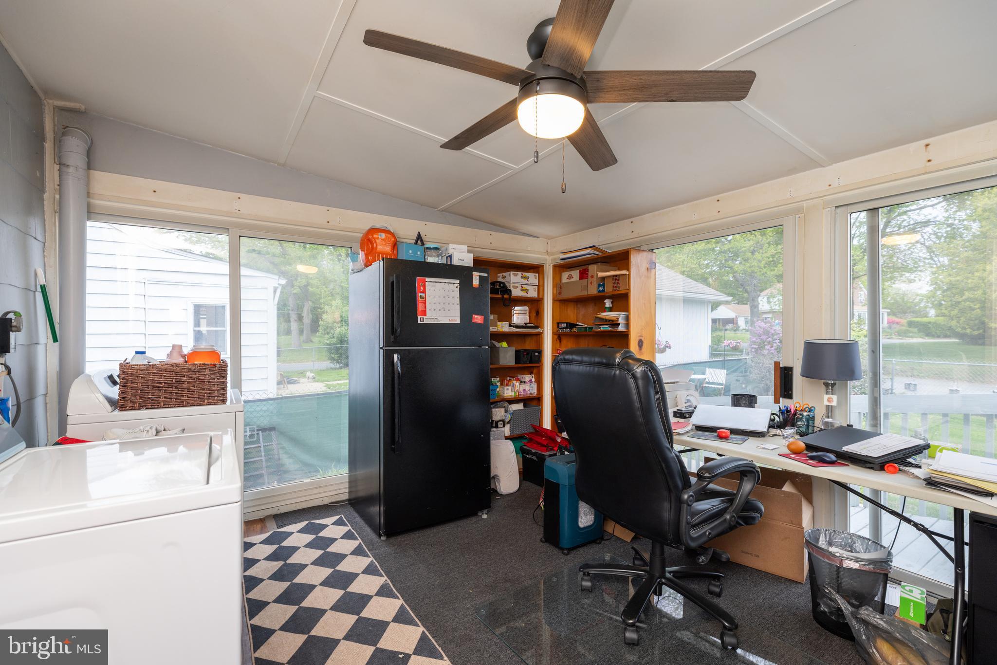 913 Aldon Road Claymont, DE 19703 - Photo 14 of 26 a view of a workspace with furniture and a window