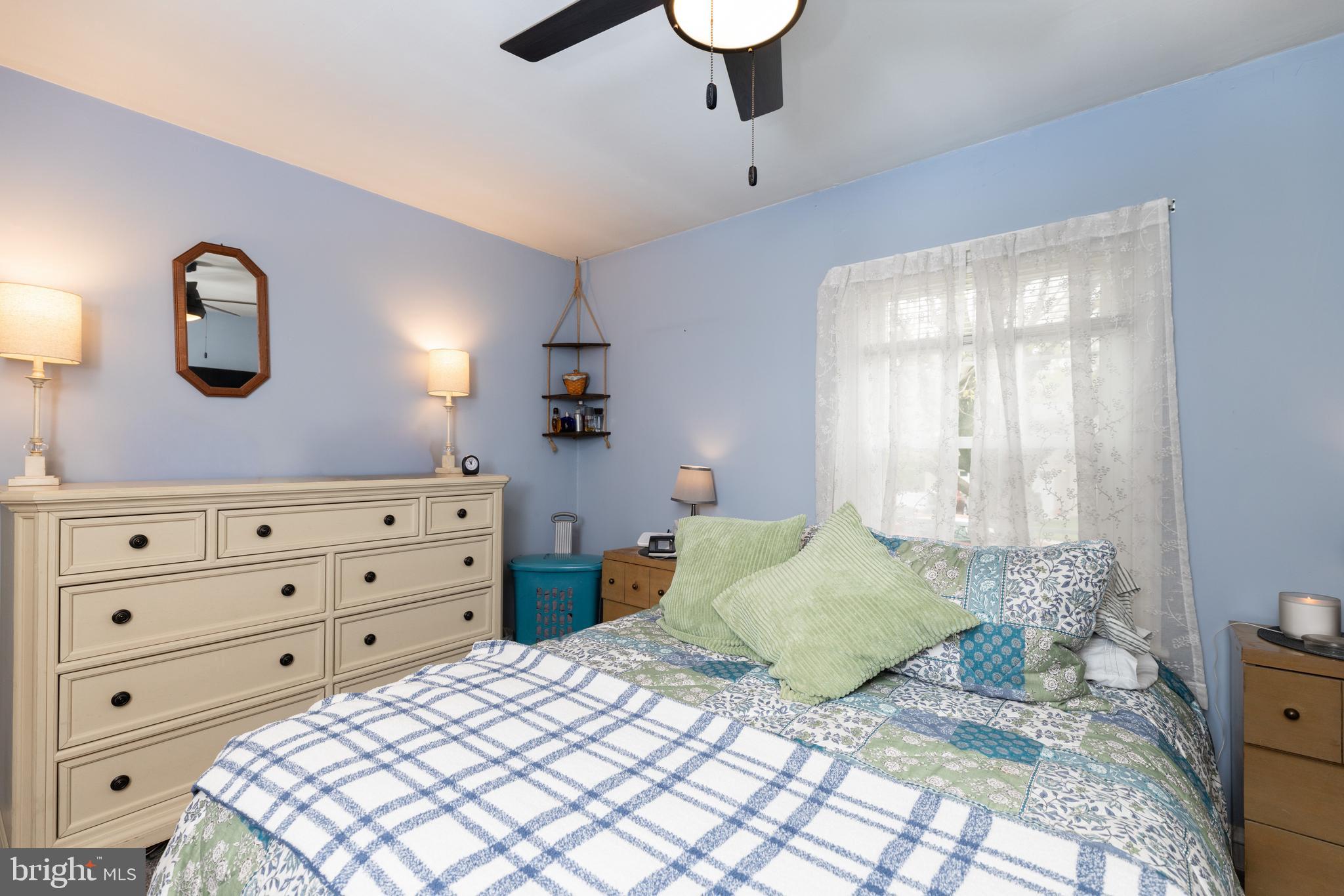 913 Aldon Road Claymont, DE 19703 - Photo 18 of 26 a bedroom with a bed and a dresser