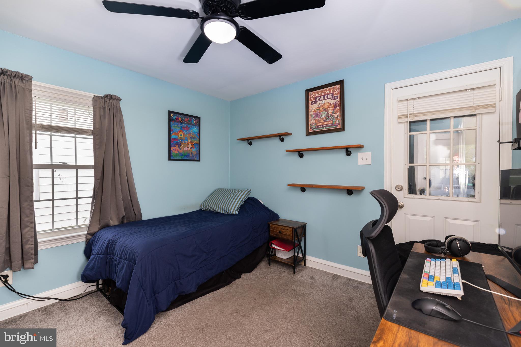 913 Aldon Road Claymont, DE 19703 - Photo 20 of 26 a bedroom with a bed and wooden floor