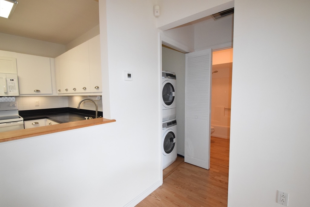 52 Kates Path, Unit 52 Yarmouth, MA 02675 - Photo 15 of 33 a view of kitchen and utility room