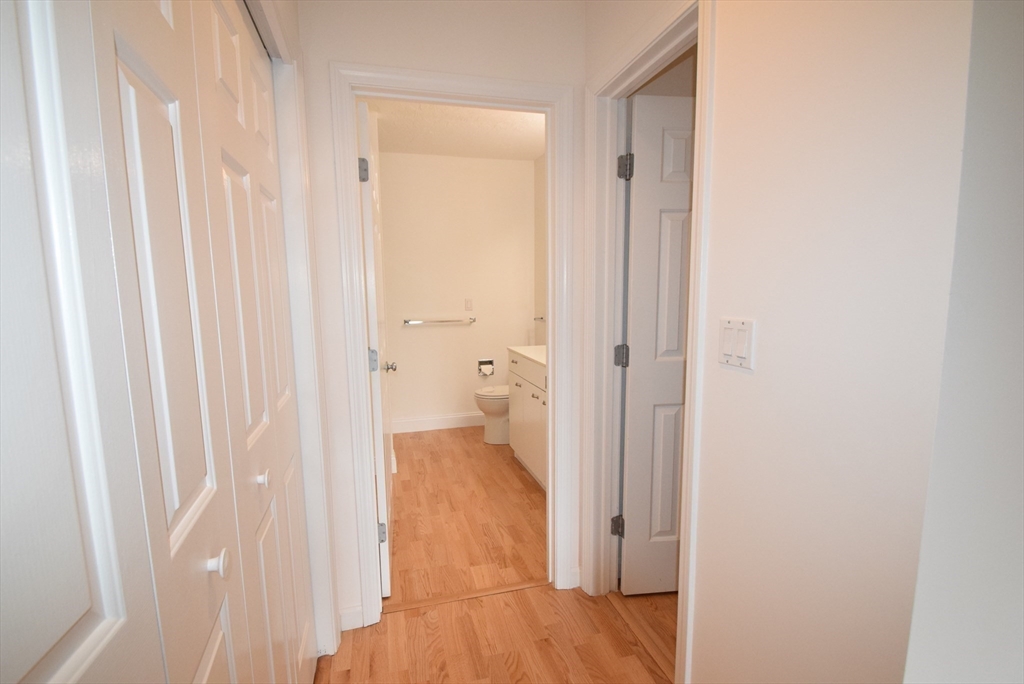 52 Kates Path, Unit 52 Yarmouth, MA 02675 - Photo 20 of 33 a view of a bathroom from a hallway