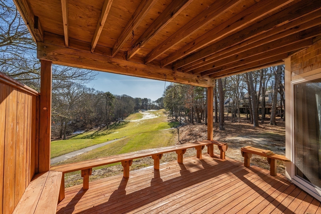52 Kates Path, Unit 52 Yarmouth, MA 02675 - Photo 29 of 33 a view of swimming pool with wooden floor