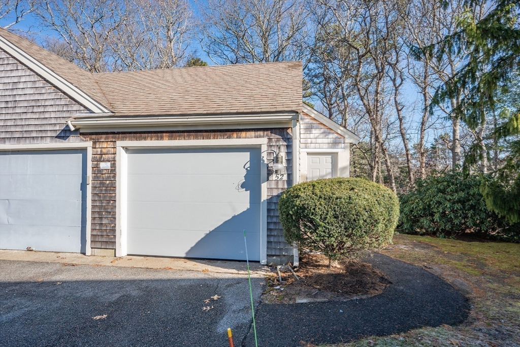 52 Kates Path, Unit 52 Yarmouth, MA 02675 - Photo 33 of 33 a view of a house with a door