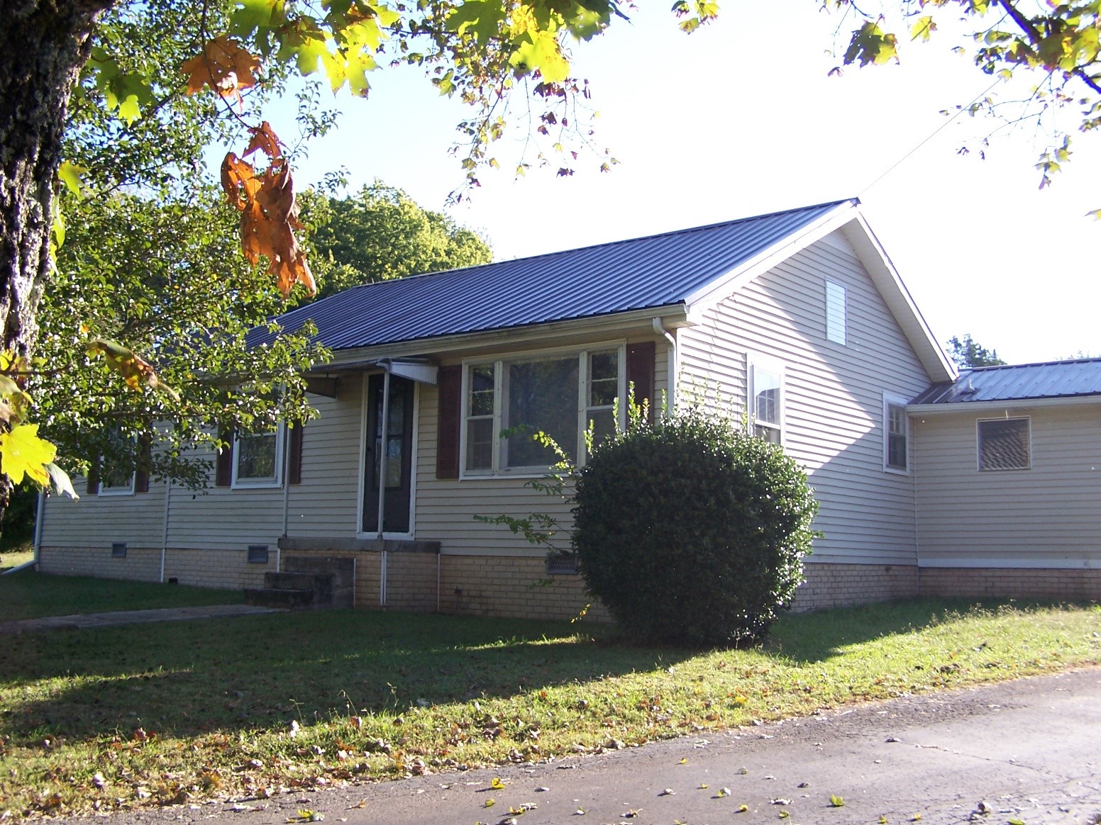 445 Prospect Road Pulaski, TN 38478 - Photo 1 of 70 a view of a house with a yard and a garden