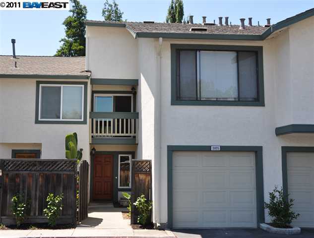 3935 Crow Canyon Road San Ramon, CA 94582 - Photo 1 of 1 a view of a house with a garage and a fireplace