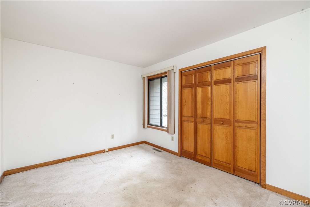 3102 Spreading Oak Road Midlothian, VA 23112 - Photo 12 of 25 an empty room with windows