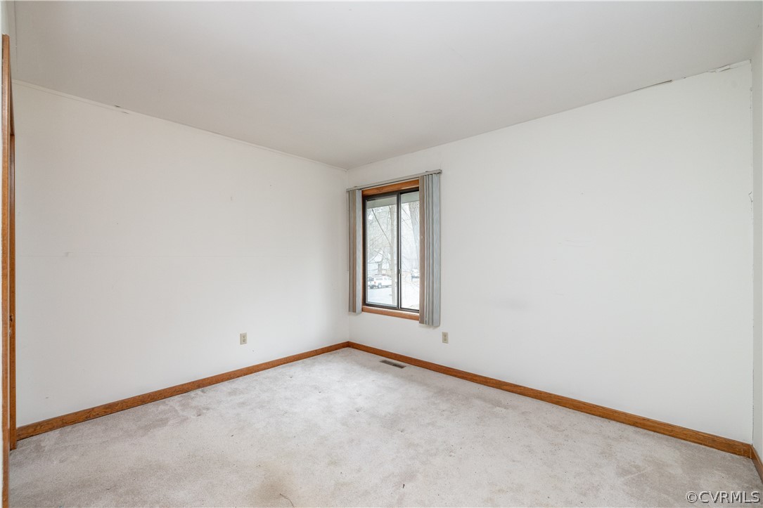 3102 Spreading Oak Road Midlothian, VA 23112 - Photo 20 of 25 an empty room with windows