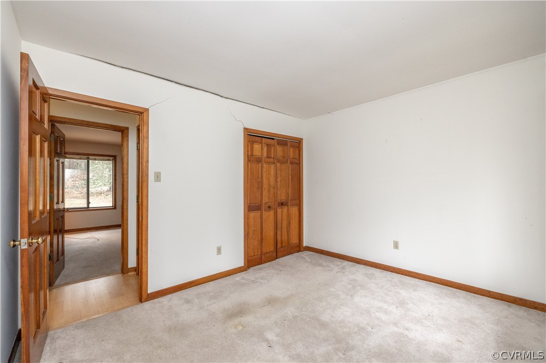 3102 Spreading Oak Road Midlothian, VA 23112 - Photo 21 of 25 an empty room with sliding door