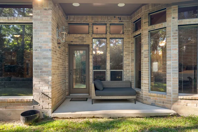 a view of front door of house with yard