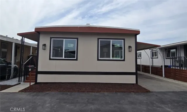 a view of backyard with deck and outdoor space