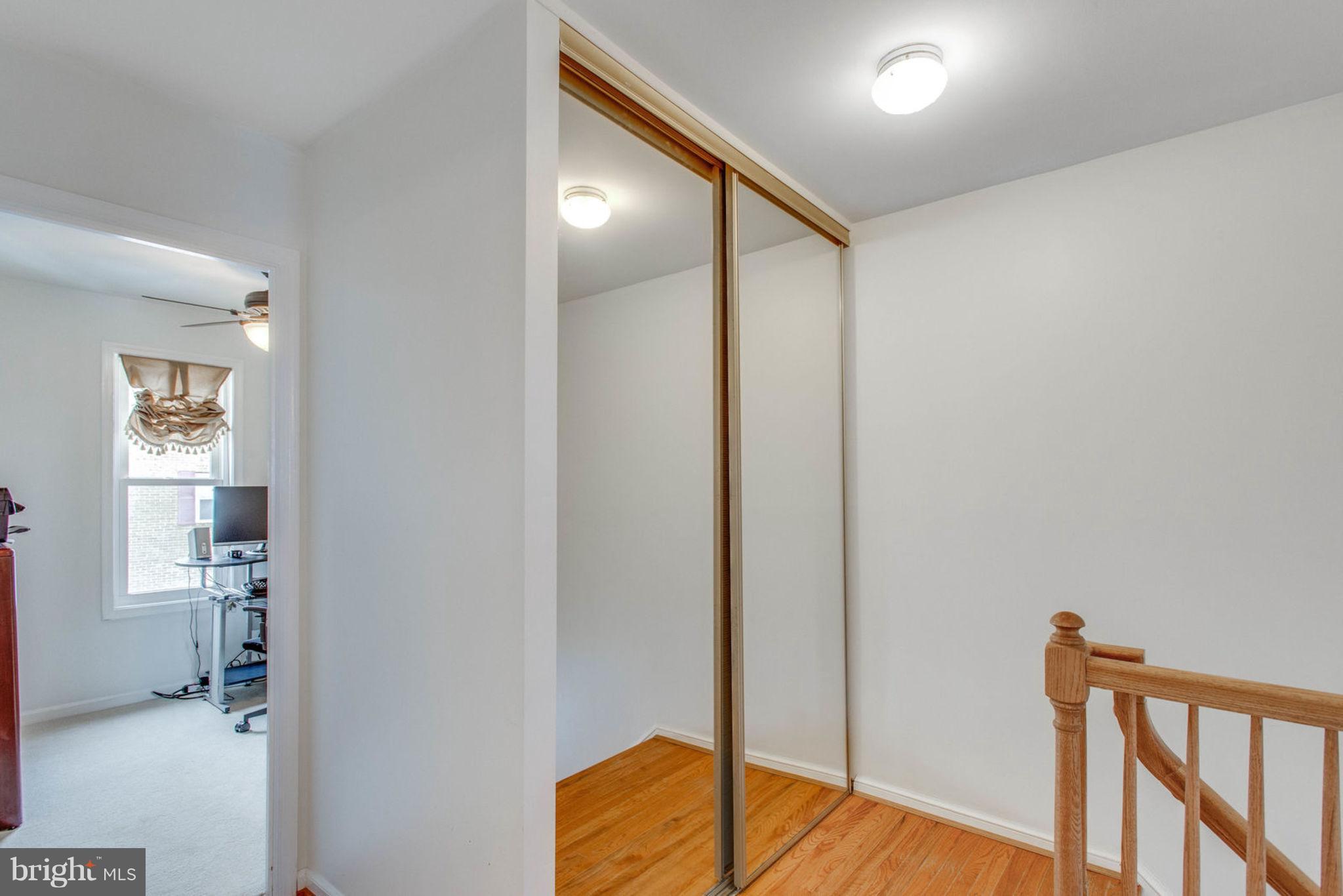9869 Lakepointe Drive Burke, VA 22015 - Photo 11 of 30 Mirrored storage closet on upper level