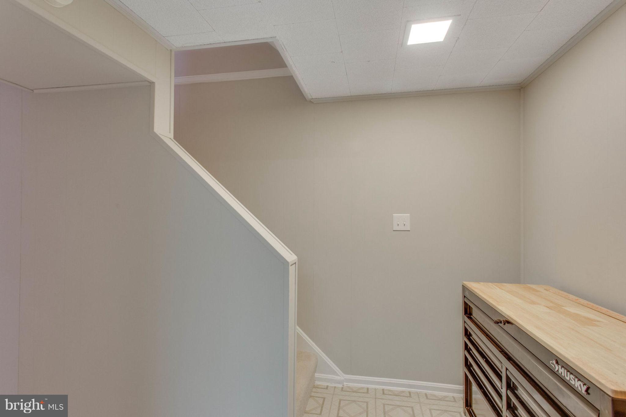 9869 Lakepointe Drive Burke, VA 22015 - Photo 20 of 30 Internal stairs lead to lower level