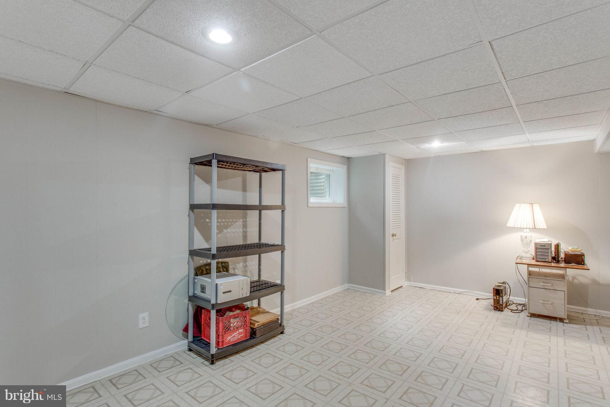 9869 Lakepointe Drive Burke, VA 22015 - Photo 23 of 30 Recessed lighting and windows offer lots of light