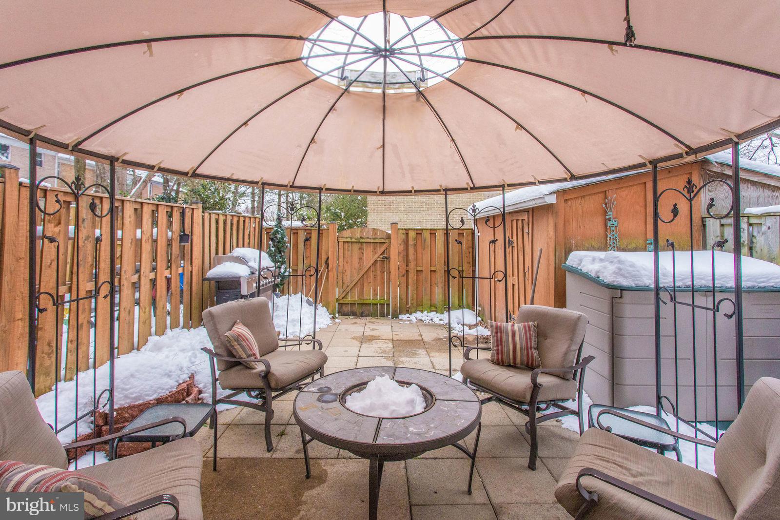 9869 Lakepointe Drive Burke, VA 22015 - Photo 27 of 30 Back patio with gazebo for relaxing or having fun