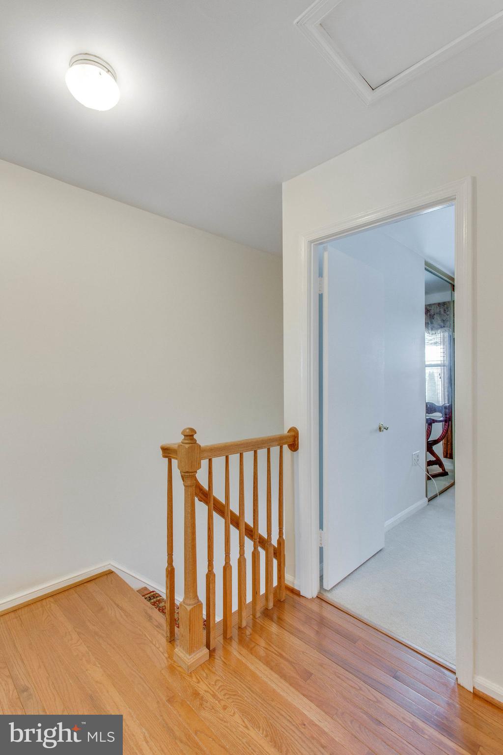 9869 Lakepointe Drive Burke, VA 22015 - Photo 10 of 30 Oak staircase and floors on upper level