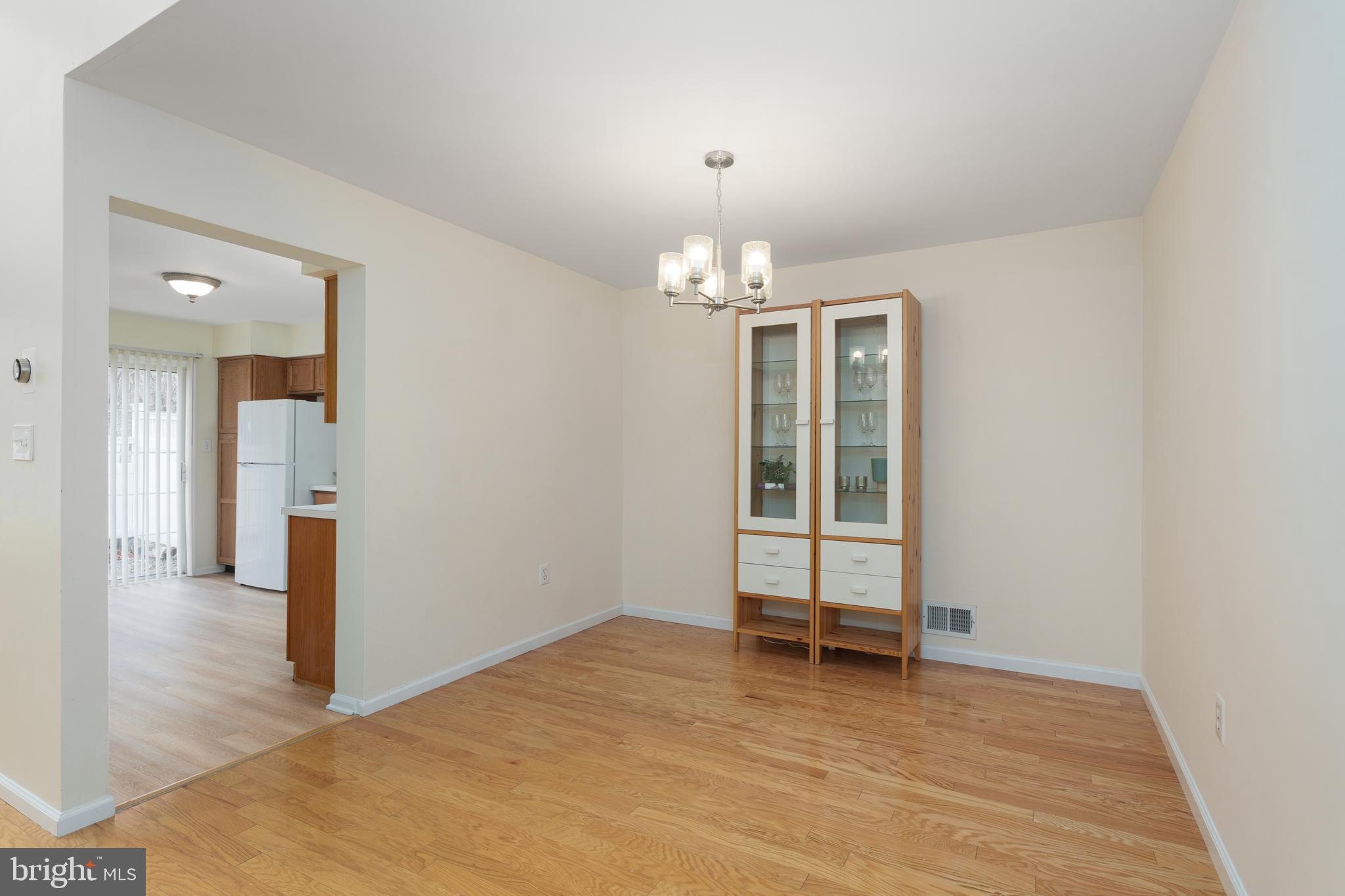 610 Bollen Court Pennington, NJ 08534 - Photo 11 of 30 a view of a livingroom with a chandelier