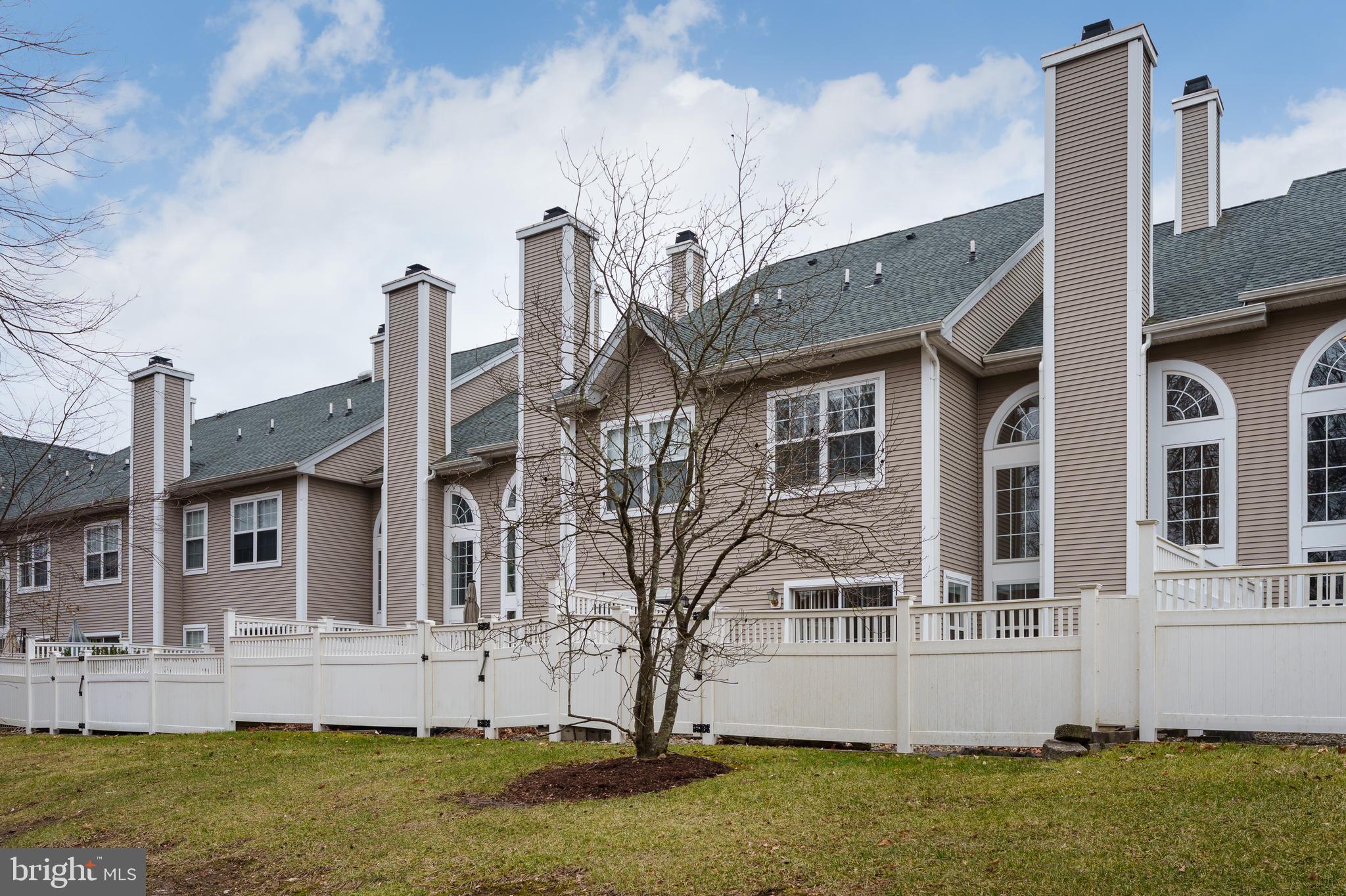 610 Bollen Court Pennington, NJ 08534 - Photo 24 of 30 a front view of a house with a garden