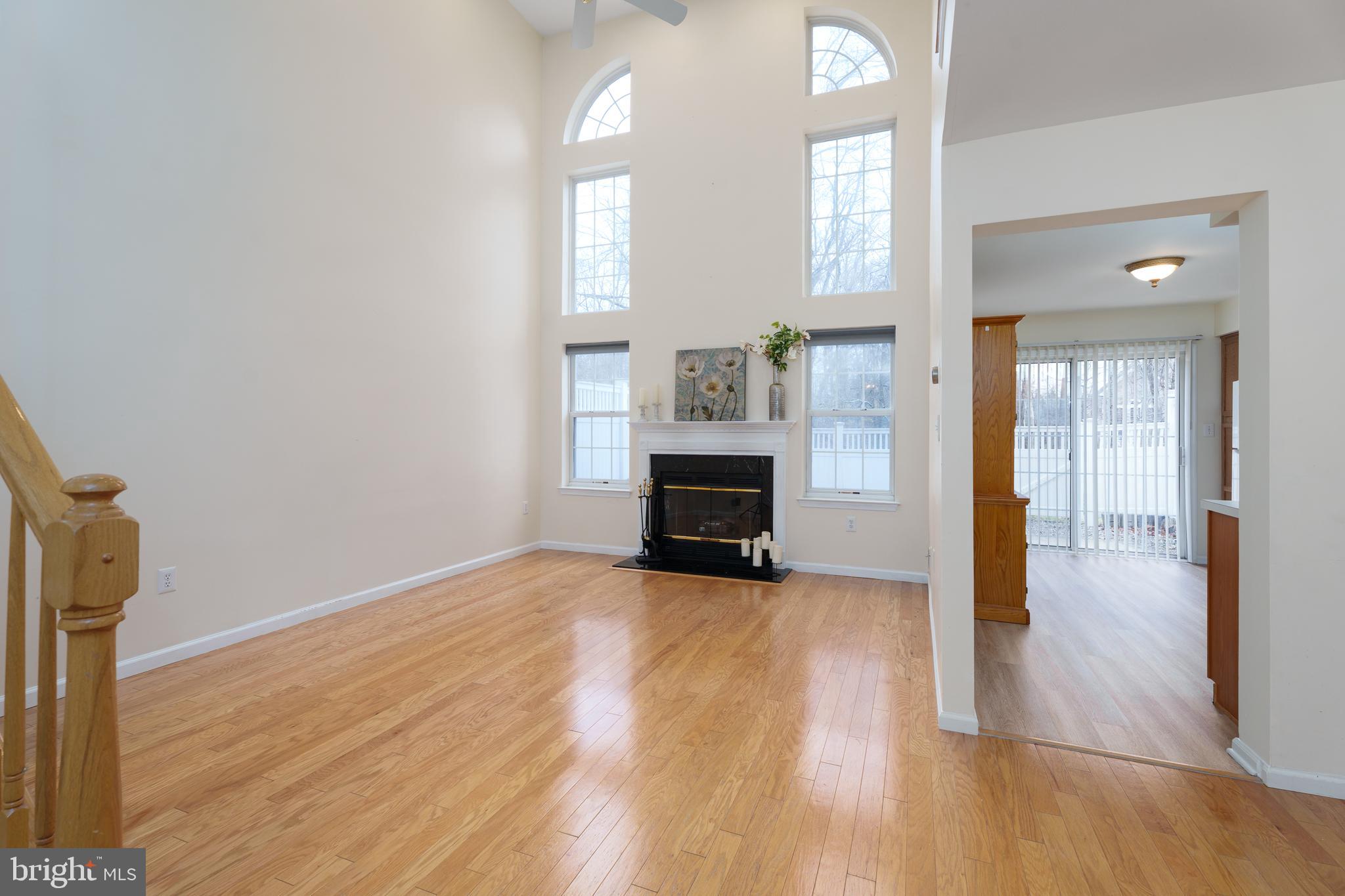 610 Bollen Court Pennington, NJ 08534 - Photo 6 of 30 a view of empty room with wooden floor and fan
