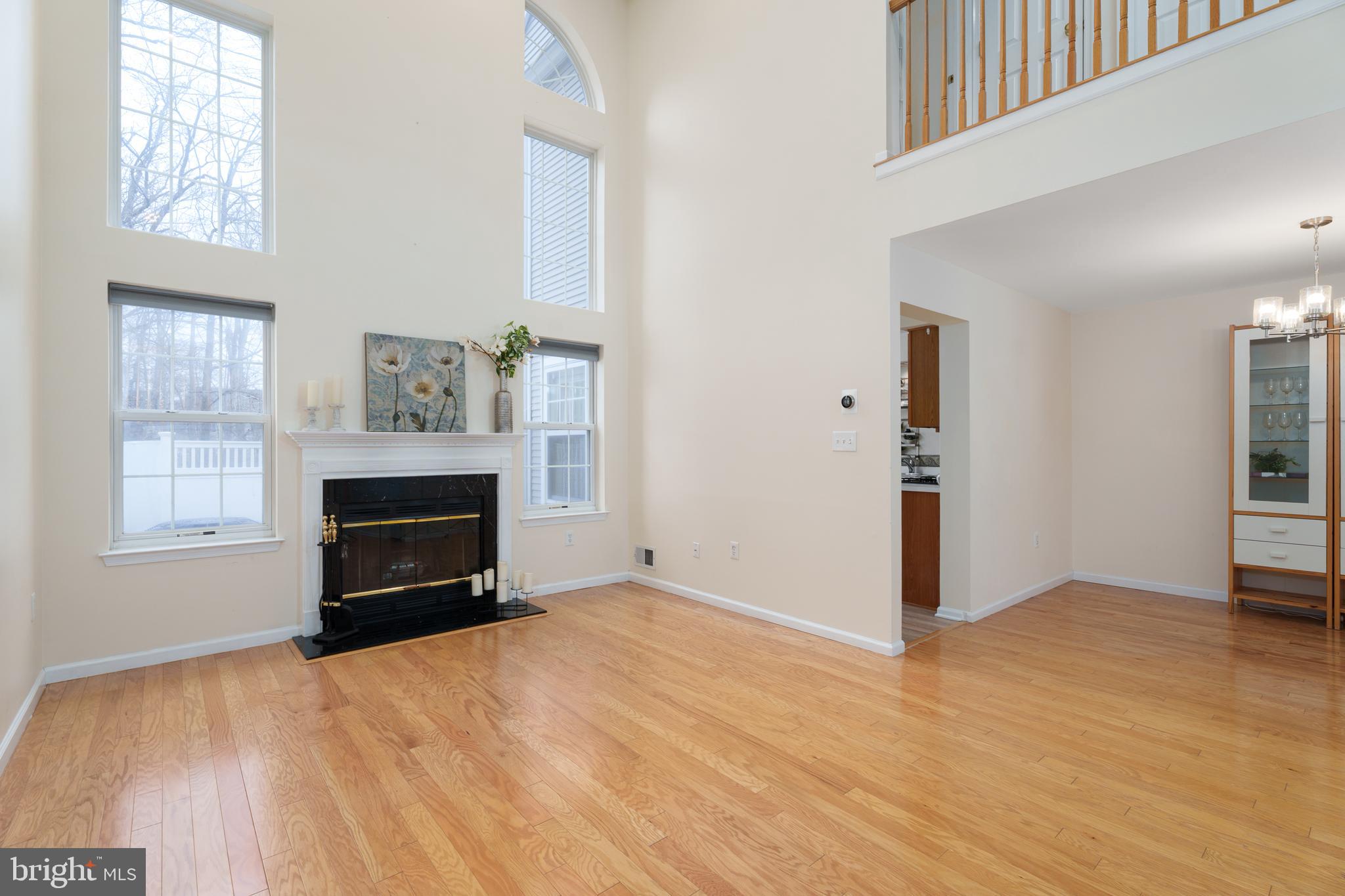 610 Bollen Court Pennington, NJ 08534 - Photo 8 of 30 a view of empty room with window and fireplace