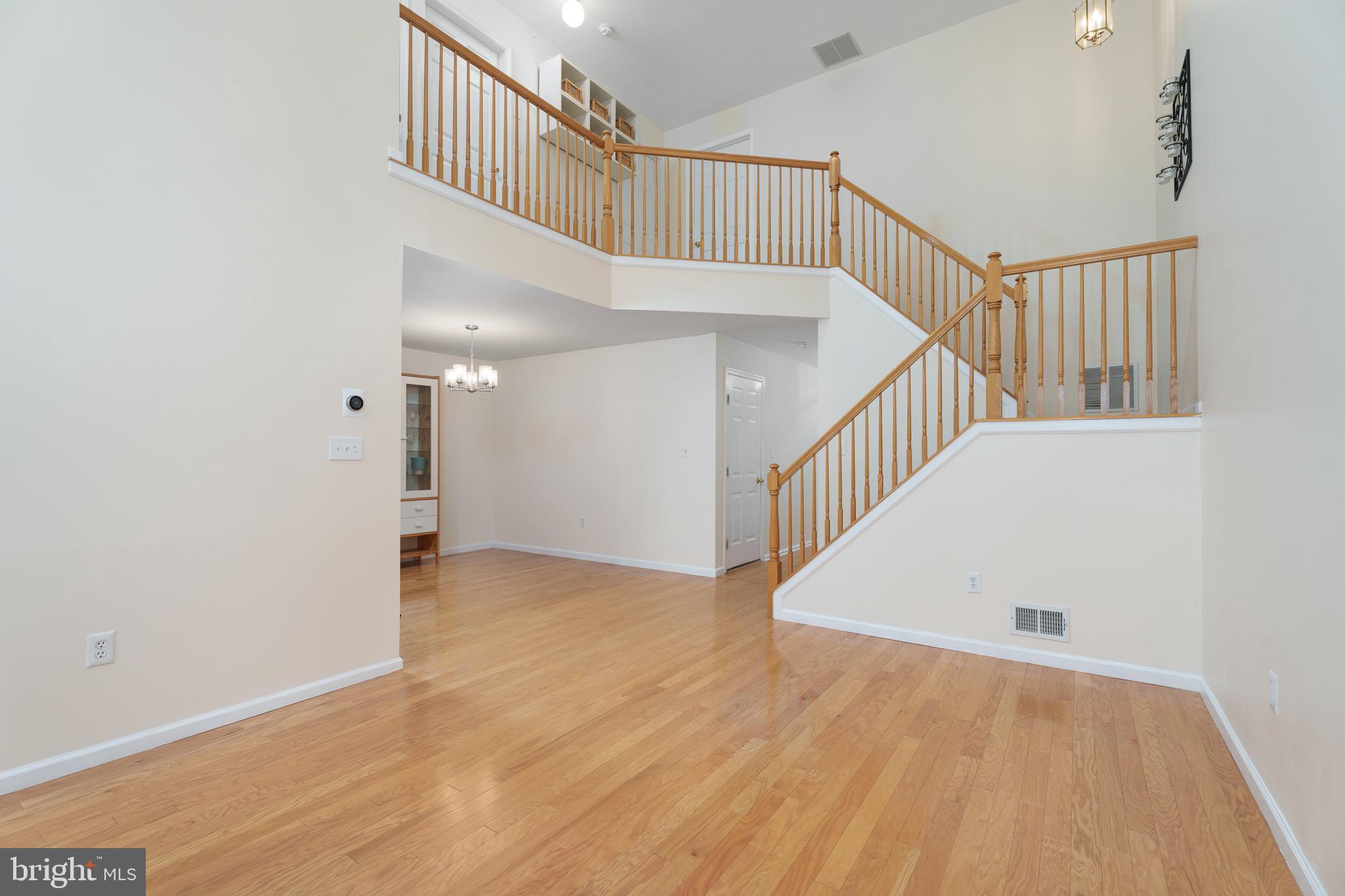 610 Bollen Court Pennington, NJ 08534 - Photo 9 of 30 a view of staircase with white walls and a window