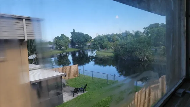 a view of a lake from a balcony