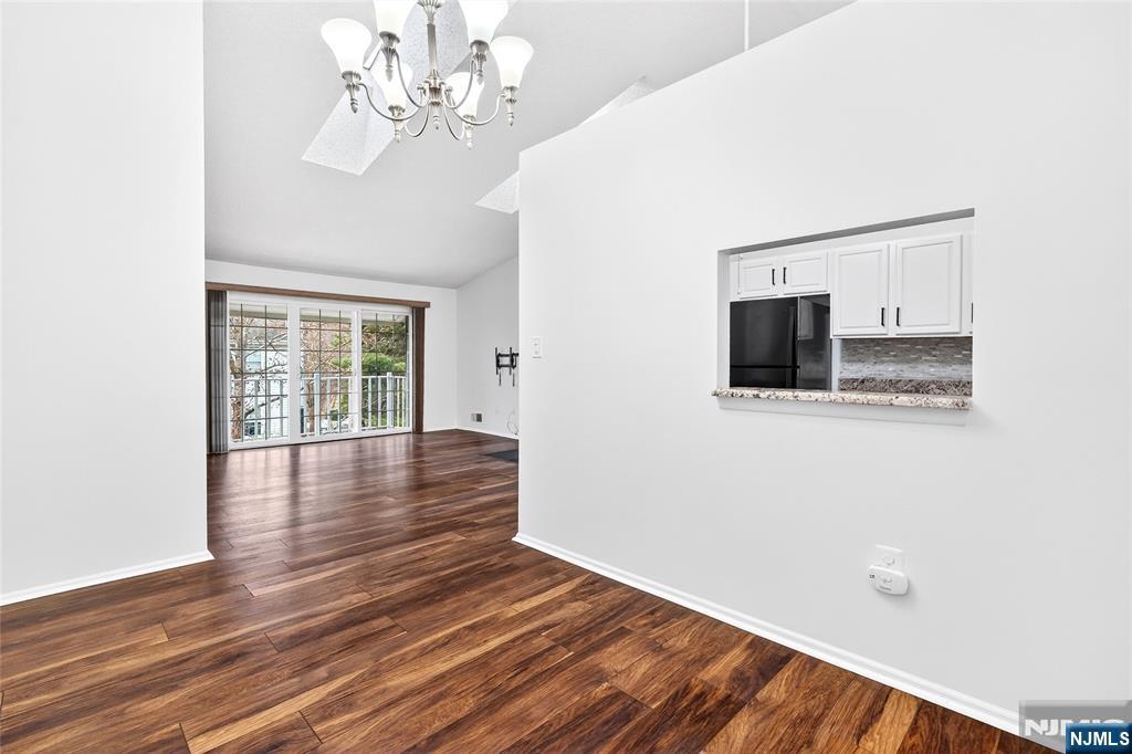 556 Holly Court Mahwah, NJ 07430 - Photo 14 of 46 a view of a livingroom with wooden floor