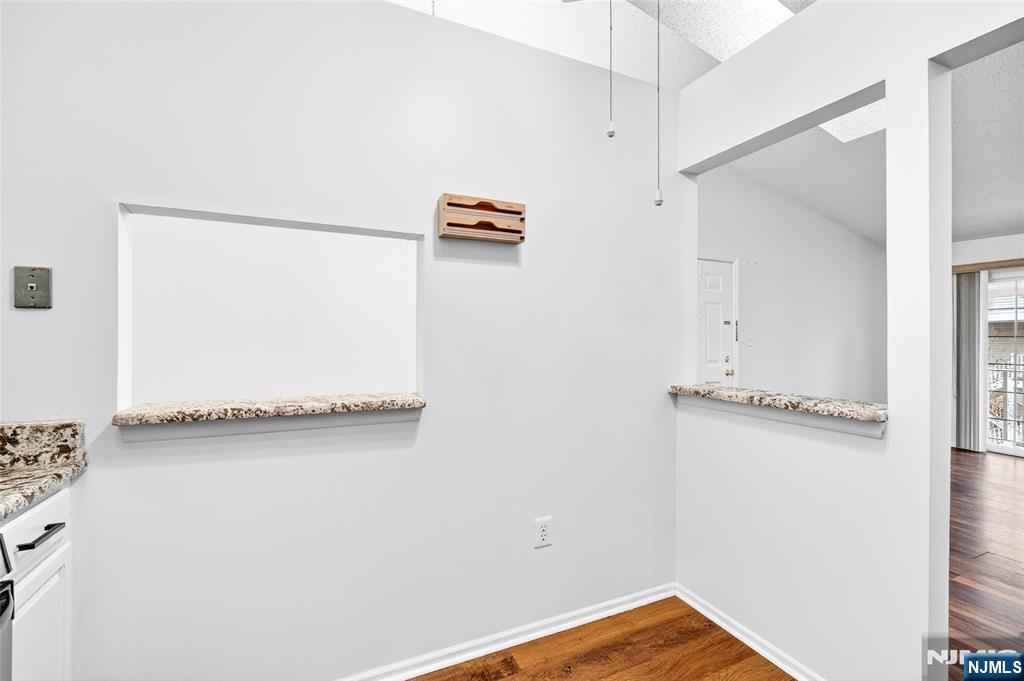 556 Holly Court Mahwah, NJ 07430 - Photo 20 of 46 a view of a room with wooden floor