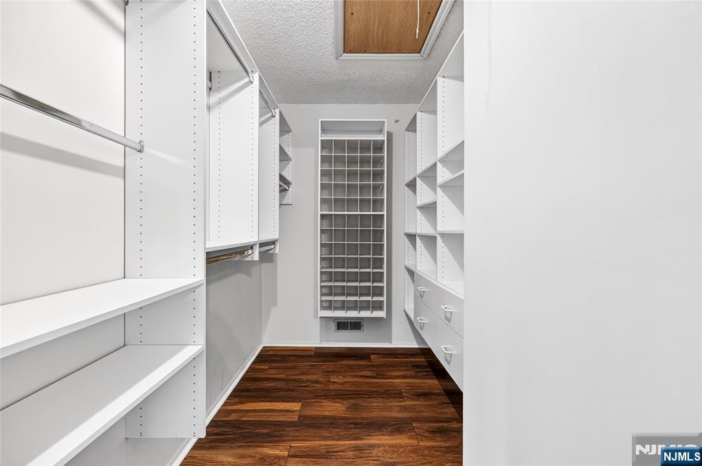 556 Holly Court Mahwah, NJ 07430 - Photo 33 of 46 a view of staircase with white walls and a window