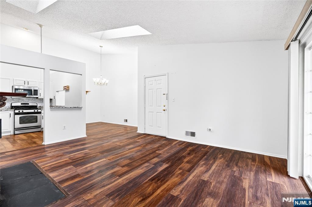 556 Holly Court Mahwah, NJ 07430 - Photo 6 of 46 a view of kitchen with wooden floor