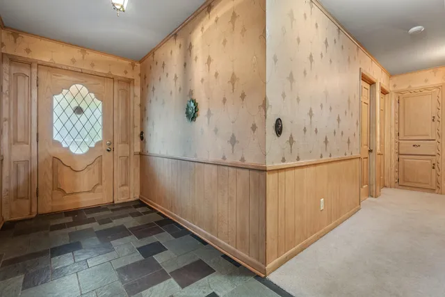 a view of a refrigerator in a kitchen