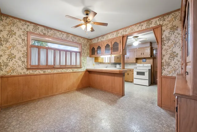 a view of a kitchen with a sink and cabinet