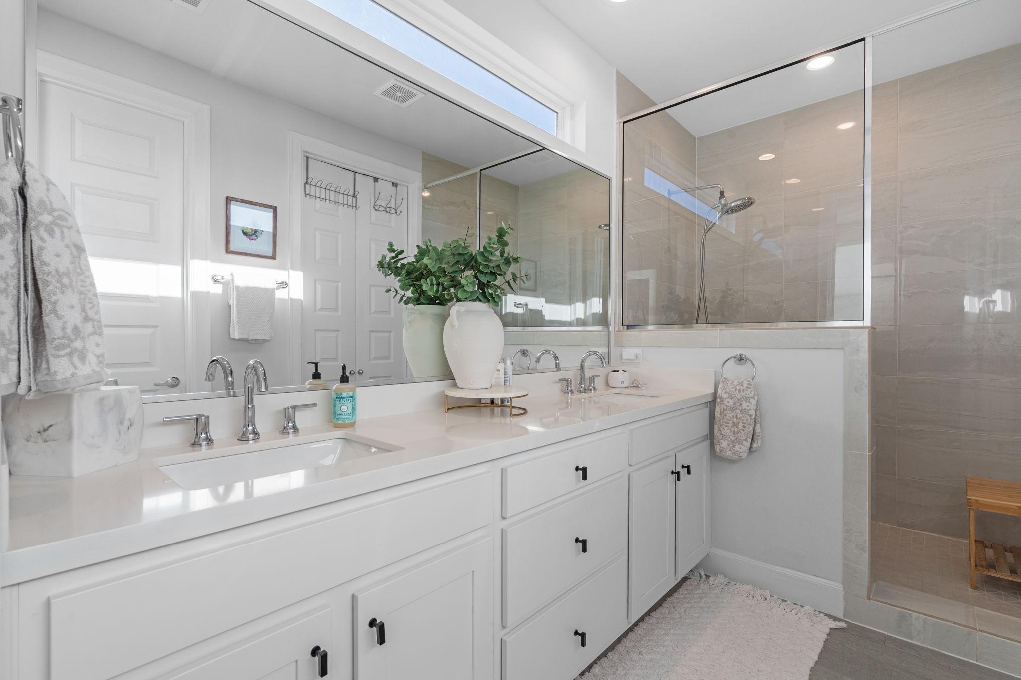502 West Donovan Street, Unit F Houston, TX 77091 - Photo 9 of 15 Double vanity with quartz countertops and ample storage