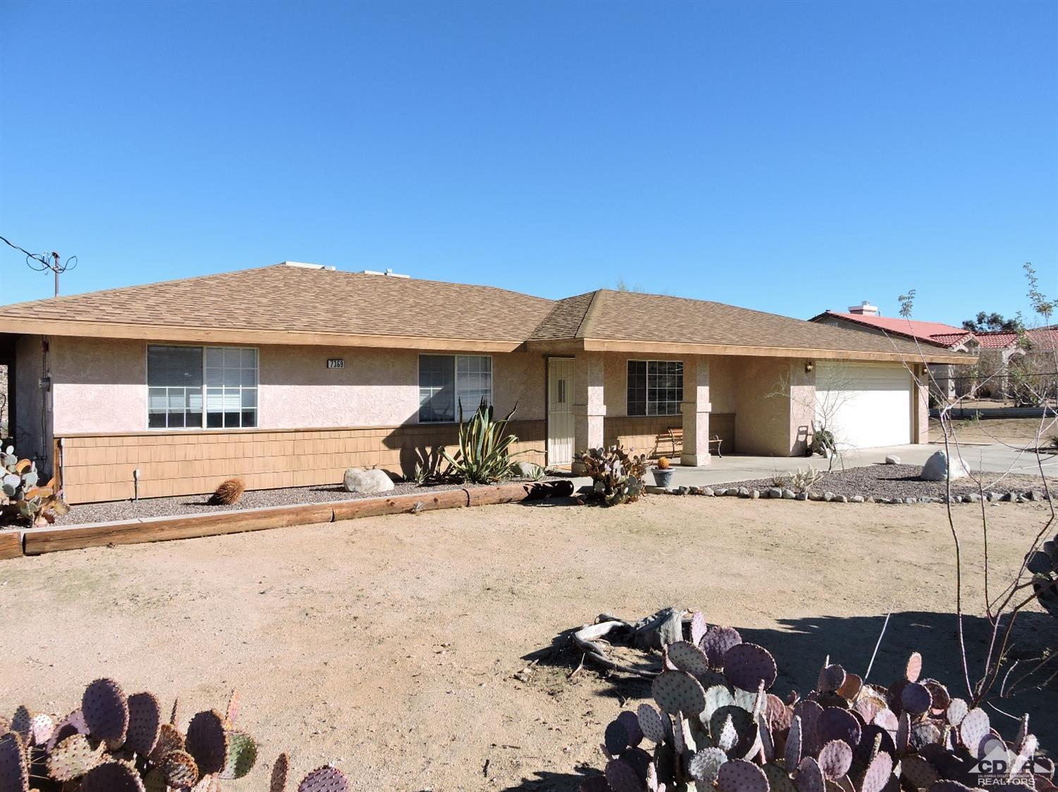 7369 Sunset Road Joshua Tree, CA 92252 - Photo 2 of 37 a view of a house with yard and sitting area