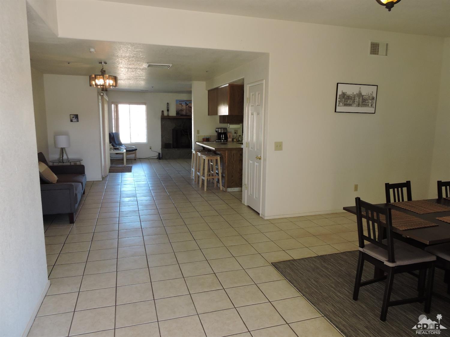 7369 Sunset Road Joshua Tree, CA 92252 - Photo 14 of 37 a view of a livingroom with furniture and a couch