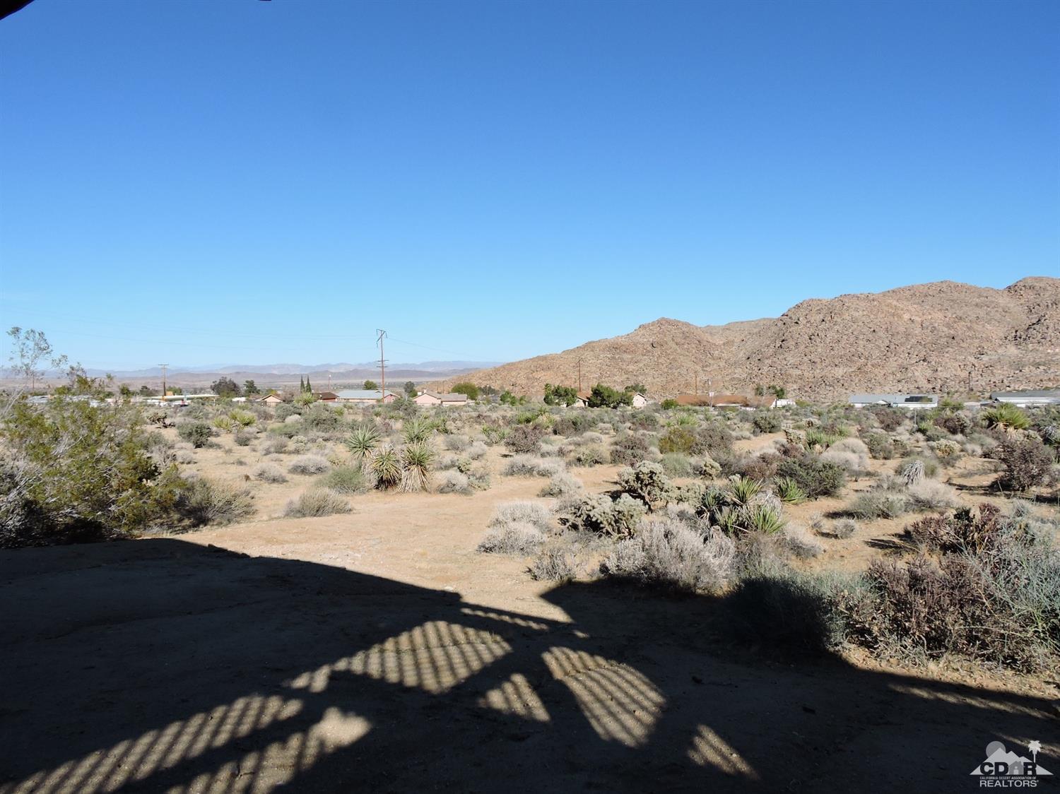 7369 Sunset Road Joshua Tree, CA 92252 - Photo 30 of 37 a view of a sky from a balcony
