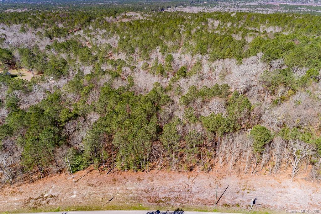 2901 (10 Acre Lot) Screaming Eagle Road Lugoff, SC 29078 - Photo 6 of 10 a view of a yard with wooden fence