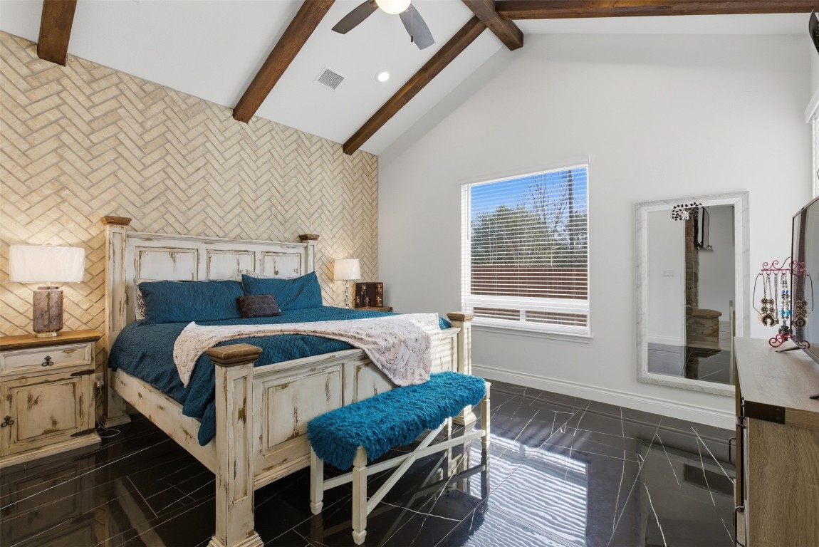 1905 South College Street Georgetown, TX 78626 - Photo 15 of 37 a bedroom with a bed and a window