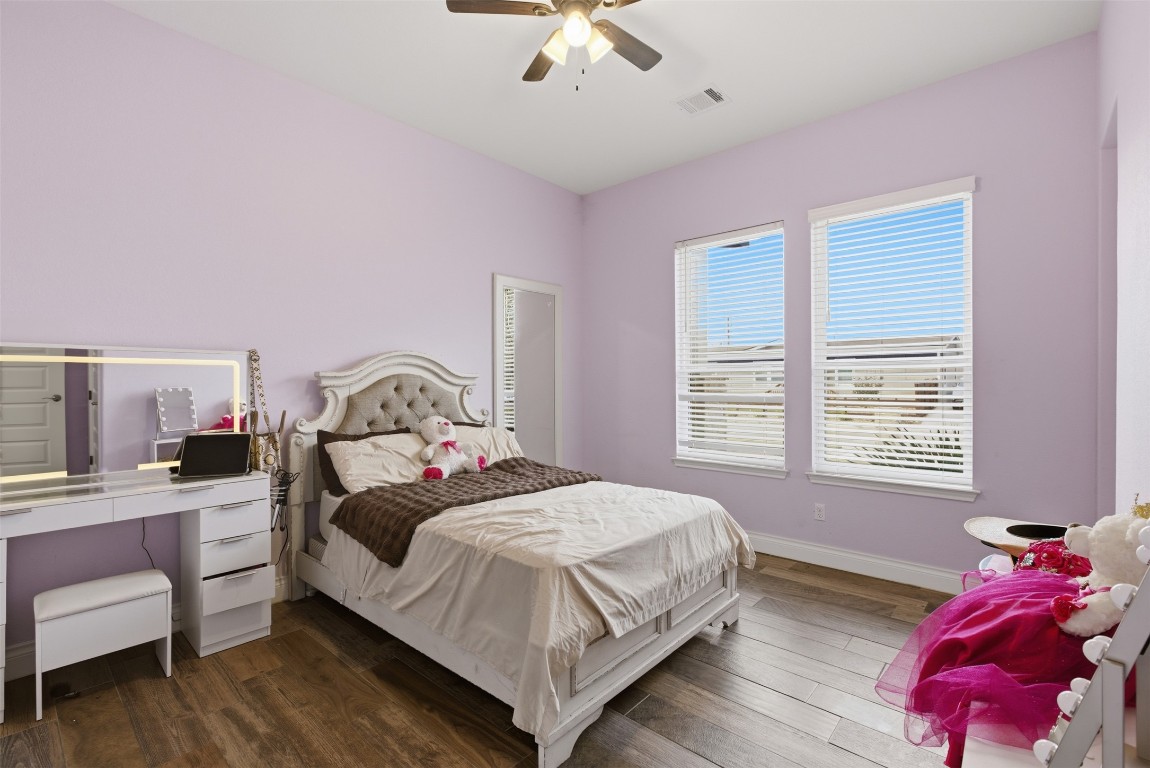 1905 South College Street Georgetown, TX 78626 - Photo 29 of 37 a bedroom with a bed and a window