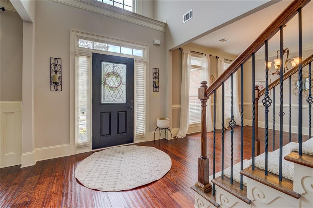 150 Alcovy Reserve Way Covington, GA 30014 - Photo 14 of 70 an entryway with wooden floor and stairs