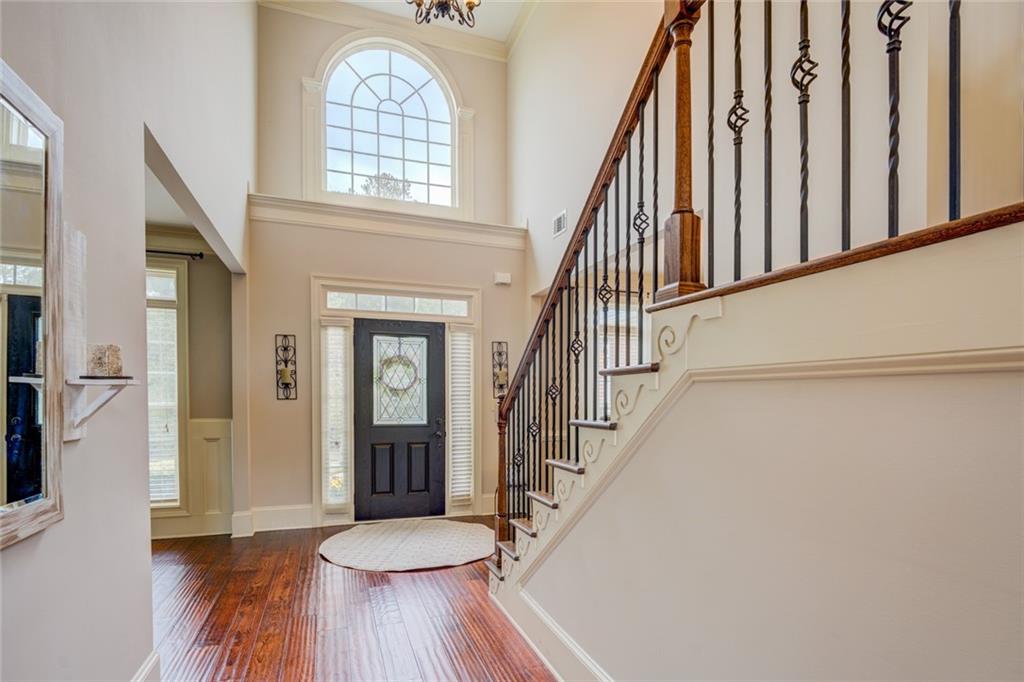 150 Alcovy Reserve Way Covington, GA 30014 - Photo 15 of 70 a view of entryway with wooden floor and a front door