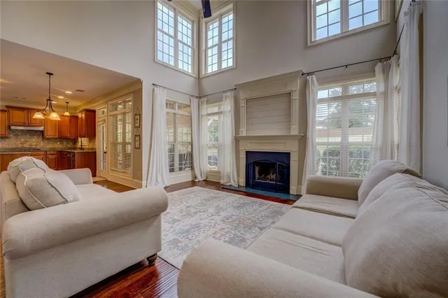 a kitchen with stainless steel appliances granite countertop a stove and a refrigerator