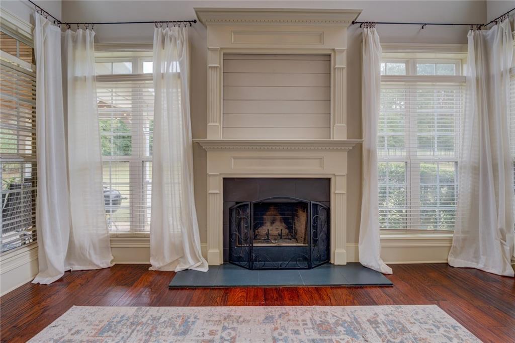 150 Alcovy Reserve Way Covington, GA 30014 - Photo 28 of 70 a living room with a fireplace